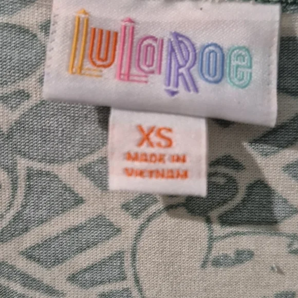 LuLaRoe Green and Cream Patterned Short Sleeve Top - Picture 3 of 3